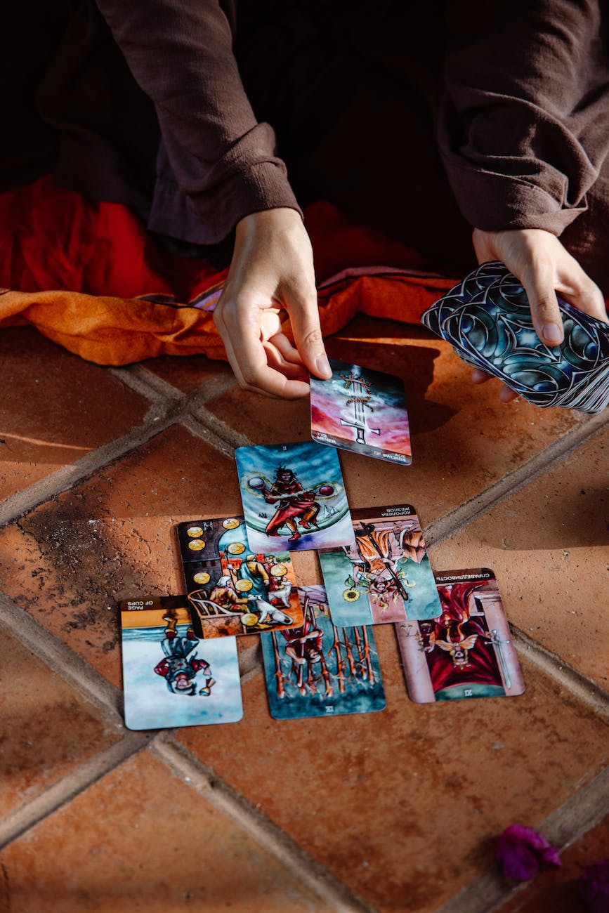 a person using tarot cards