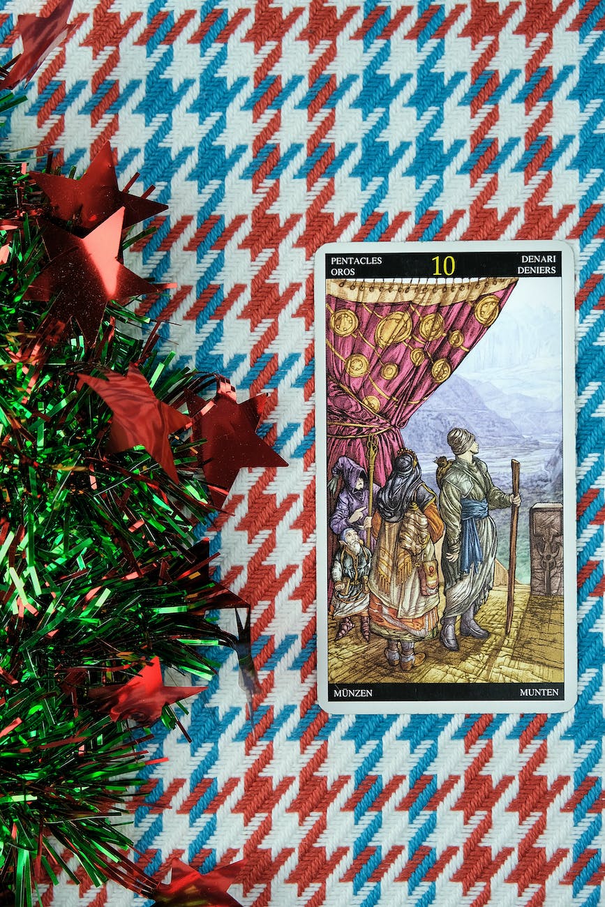 tarot card and wreath on checkered background